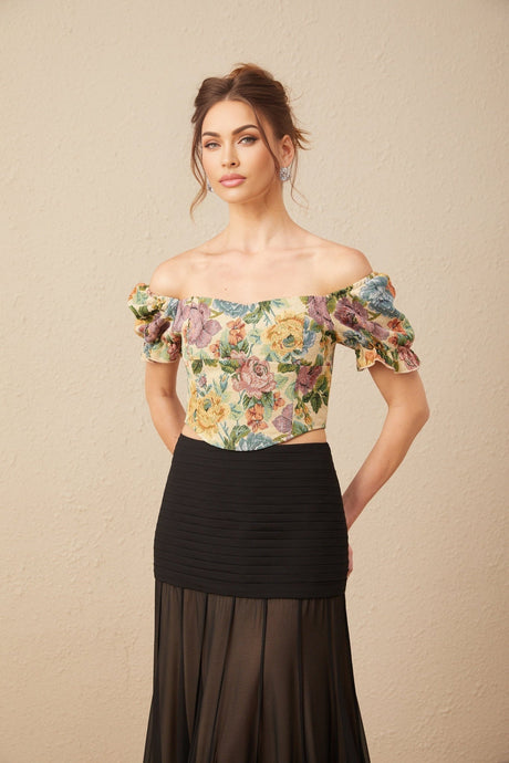 A cropped top with a floral print pattern in jacquard fabric featuring a design called Constance