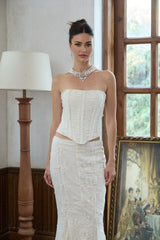 A delicate layered necklace featuring zircon stones and pearls with a Catherine design