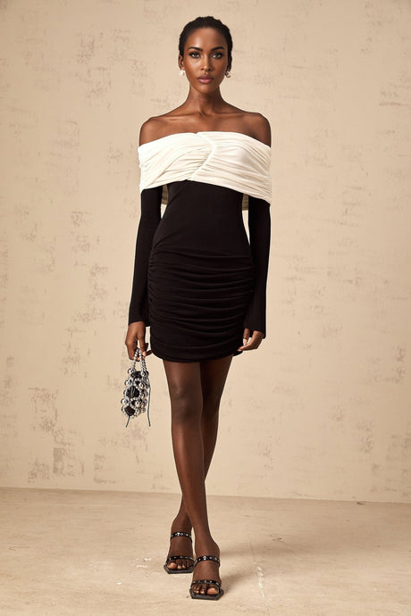 A fitted mini dress with colorblocking design featuring ruched details named Angelique