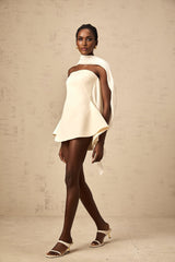 A flared mini dress with a ribbon design named Danae featuring a short hemline and likely a fitted bodice that flares out towards the bottom
