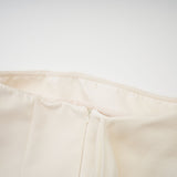 A flared mini dress with a ribbon design named Danae featuring a short skirt and decorative ribbon elements throughout the fabric