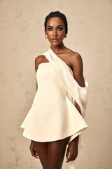 A flared mini dress with a ribbon design pattern named Danae in a vibrant color