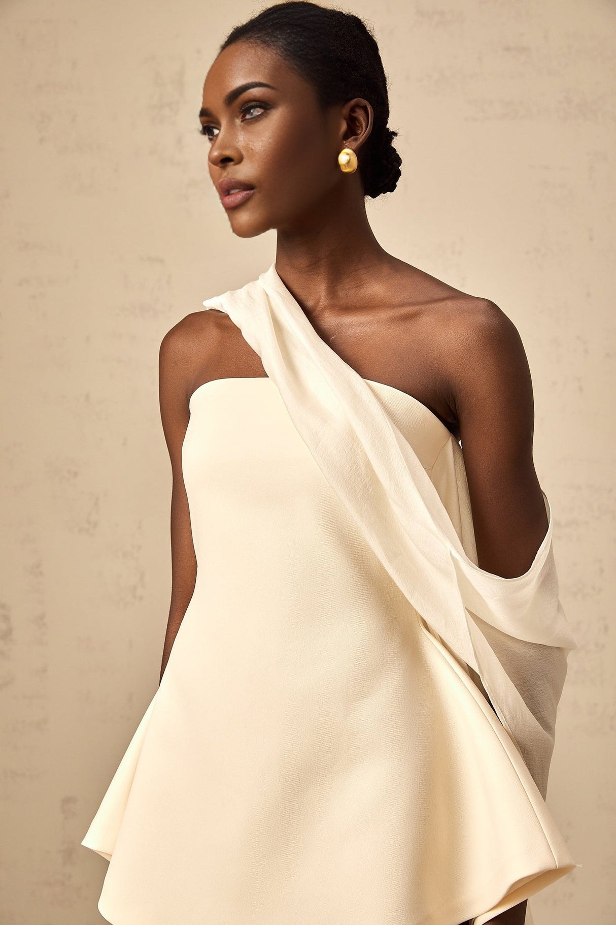 A flared mini dress with ribbon design details named Danae