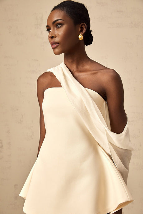 A flared mini dress with ribbon design details named Danae