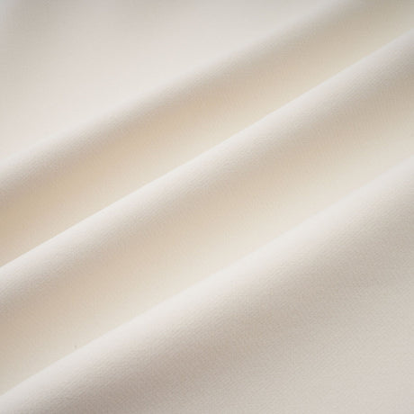 A flared mini dress with ribbon designs named Danae featuring a short skirt and decorative ribbon elements throughout the garment