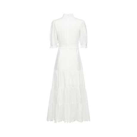 A floral lace midi dress with embroidered flower details