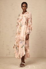 A floral patterned midi dress with ruffled trim details named Patricia
