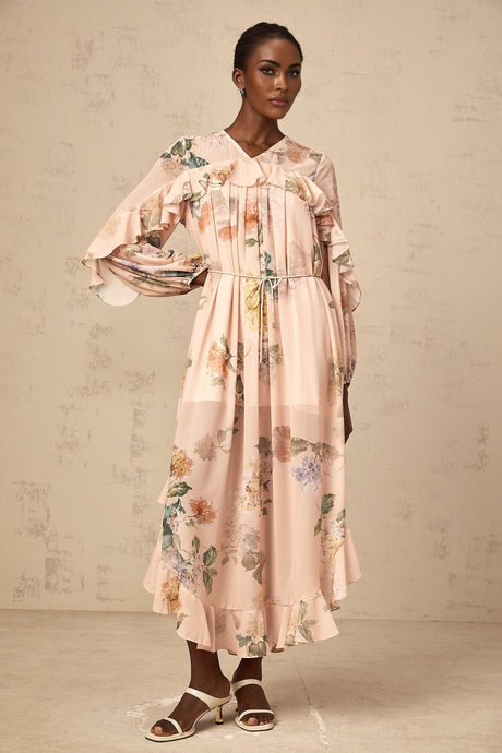 A floral print midi dress with ruffled trim named Patricia featuring a feminine silhouette and vibrant pattern