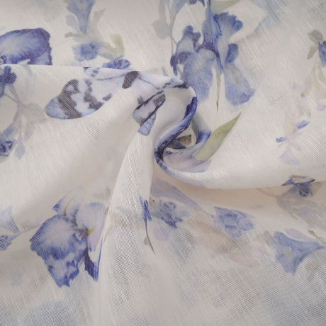 A floral print mini dress with a flared skirt made of chiffon fabric featuring a delicate floral pattern on a light background with short sleeves and a fitted bodice