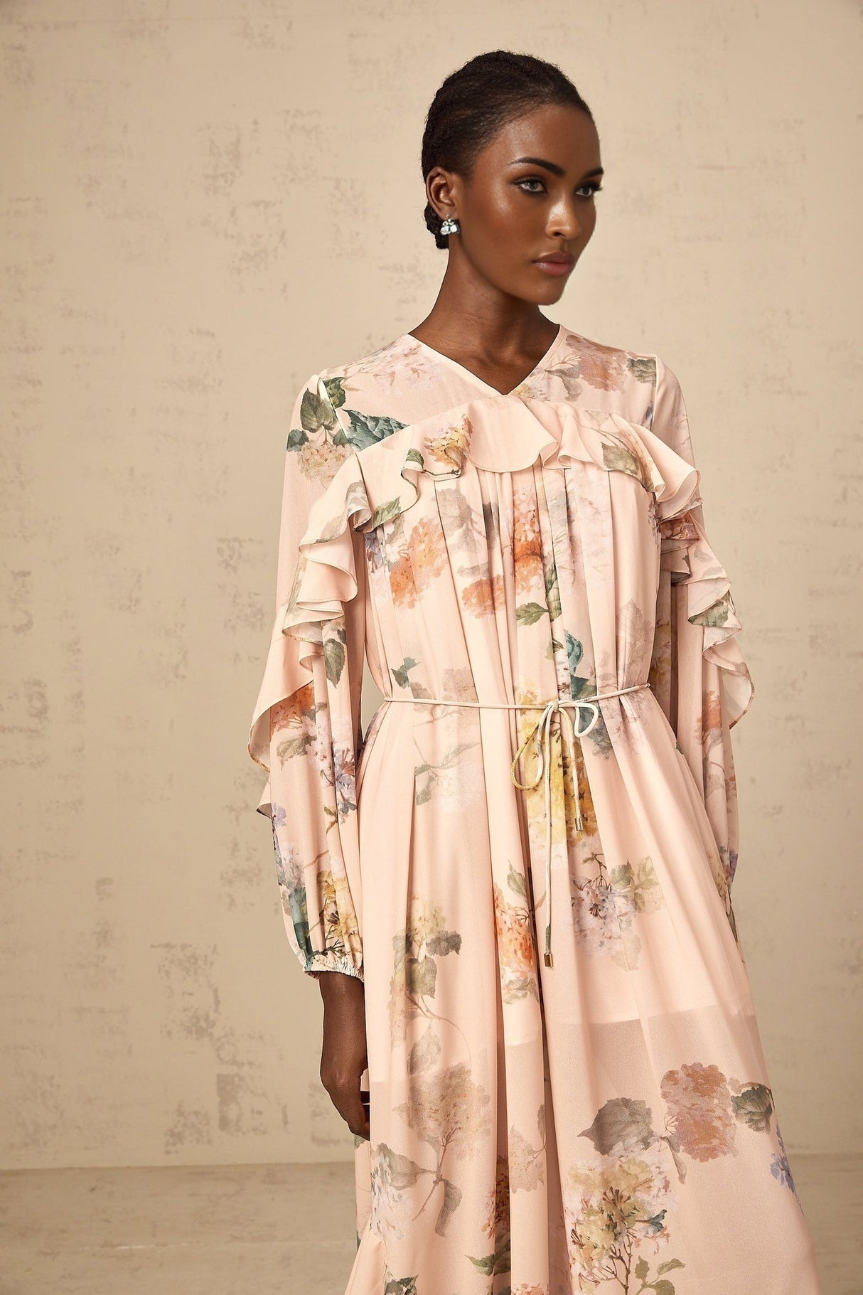 A floral printed midi dress with ruffled trim details named Patricia