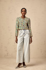 A goldtoned tweed jacket with a checked pattern and sequin embellishments