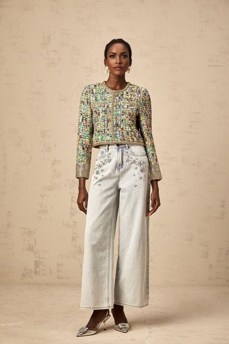 A goldtoned tweed jacket with a checked pattern and sequin embellishments