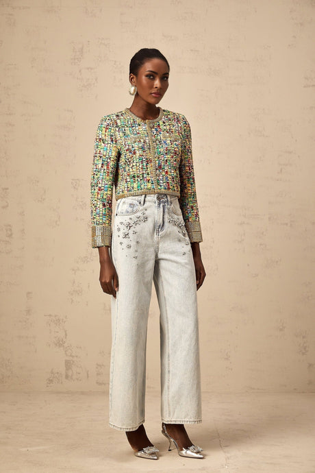 A goldtoned tweed jacket with a checked pattern and sequin embellishments