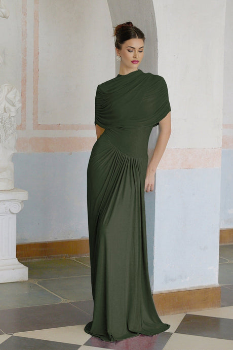 A green asymmetric maxi dress with pleated details and a long flowing skirt