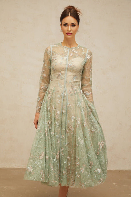 A green pleated midi dress with floral embroidery details named Philomene