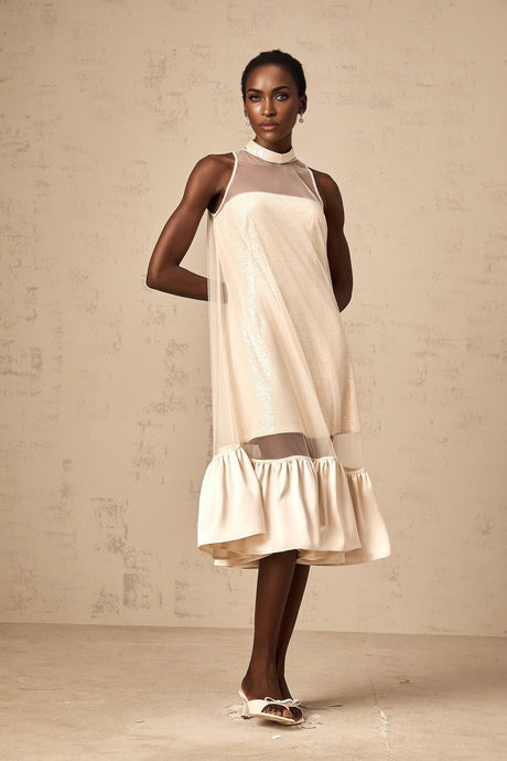 A layered midi dress with a sequined bodice and tulle panels featuring a shimmering design and delicate details named Josette
