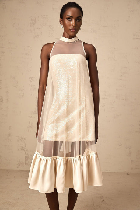 A layered midi dress with a tulle panel and sequin embellishments named Josette featuring multiple tiers and a shimmering appearance