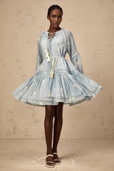 A light blue mini dress with delicate floral embroidery featuring a fitted waist and short sleeves