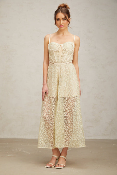 A light green midi dress with floral embroidery patterns named Yasmine