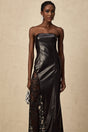 A long black dress with a faux leather body and lace panels featuring a maxi length silhouette
