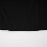 A long black maxi dress with a hood featuring floral appliques on the bodice