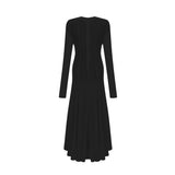A long black maxi dress with a wavy lace pattern flowing from top to bottom featuring a feminine silhouette and delicate details