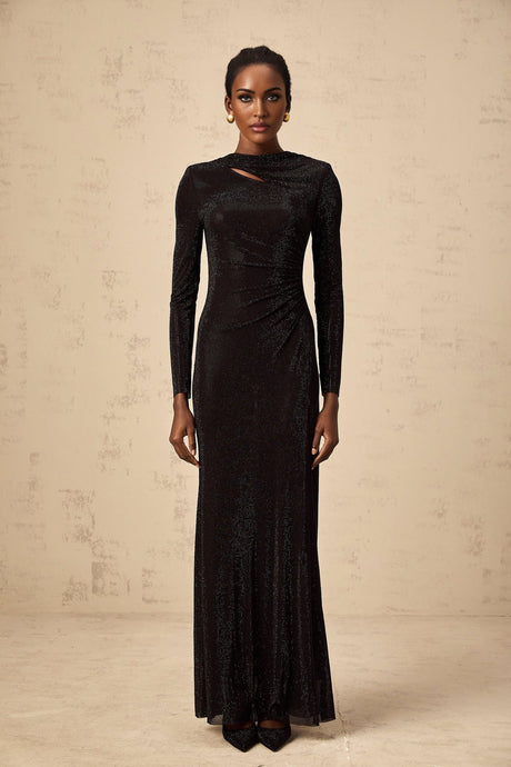 A long black maxi dress with ruched mesh fabric and rhinestone embellishments