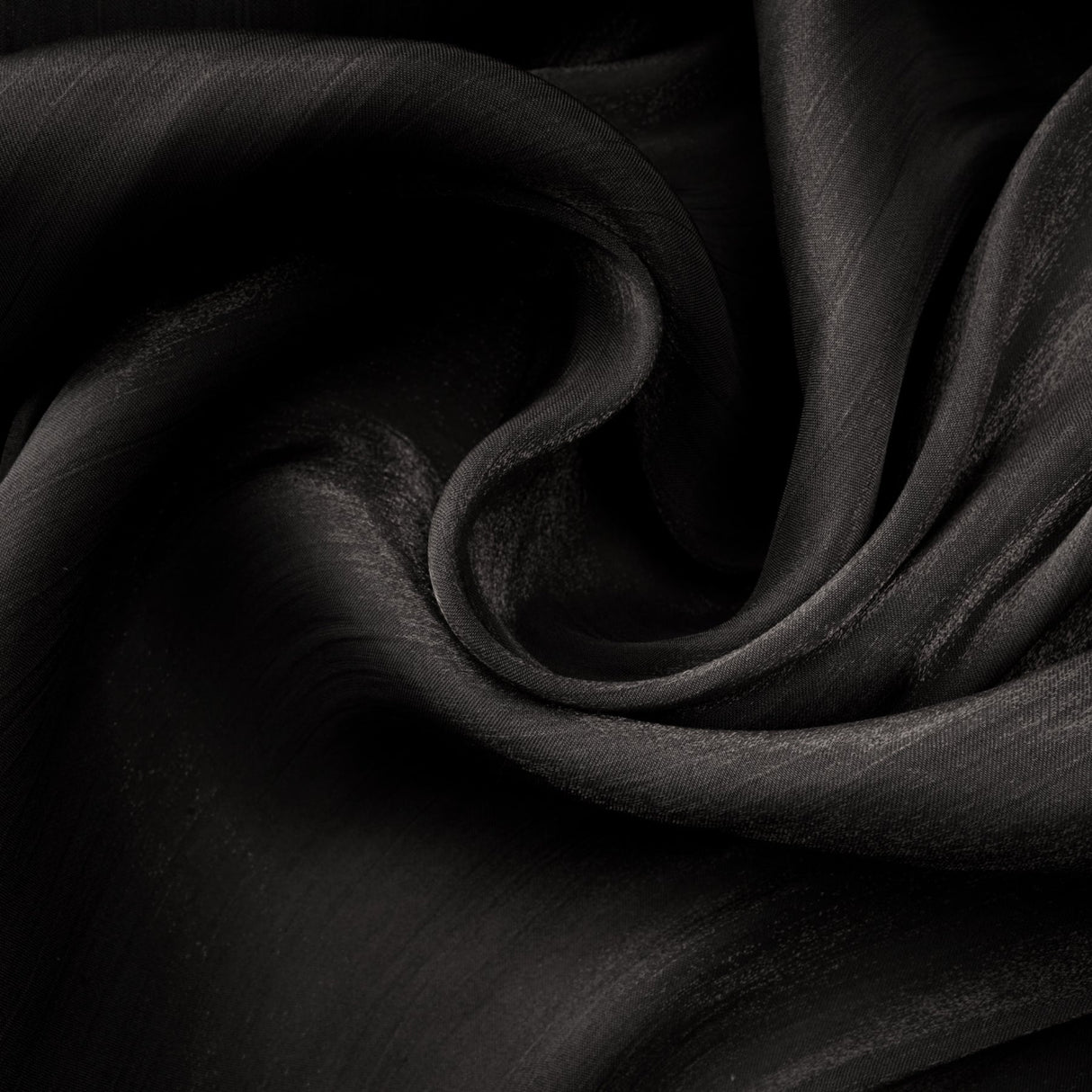 A long black pleated satin maxi dress with a flowing silhouette named Mila
