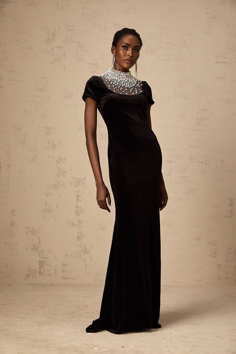 A long black velvet maxi dress with faux pearl embellishments named Kristin