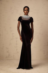 A long black velvet maxi dress with faux pearl embellishments named Kristin