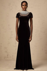 A long black velvet maxi dress with faux pearl embellishments named Kristin