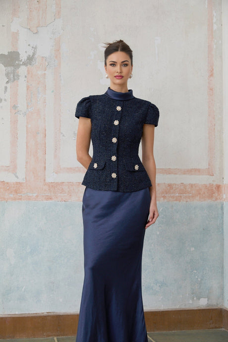 A long blue maxi dress with a peplum waist and panelled design named Josette
