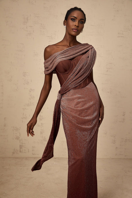 A long brown maxi dress with a corset bodice featuring a ribbon design detail named Delphine
