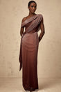 A long brown maxi dress with a corset bodice featuring ribbon design details and a flowing skirt