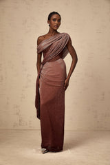 A long brown maxi dress with a corsetstyle top featuring ribbon design details and a flowing skirt