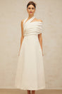 A long creamwhite maxi dress with an asymmetric design featuring a Solene label