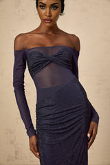 A long dark blue maxi dress with a corset bodice featuring tulle panels and embellishments