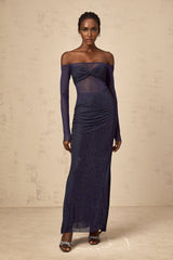 A long dark blue maxi dress with a corsetstyle bodice featuring sheer tulle panels and embellished details