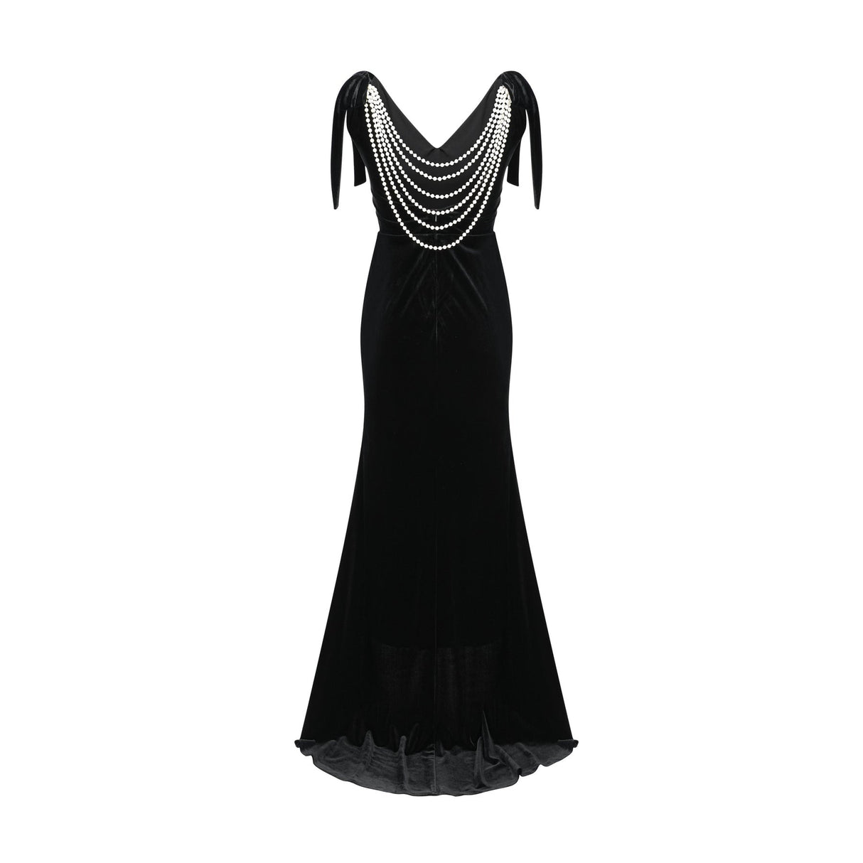 A long dark velvet dress with an open back and embellished details named Audrey shown on a model