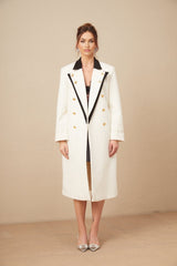 A long doublebreasted blazer made of wool featuring colorblocked design in shades of terracotta and beige with contrasting lapels and pockets