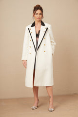 A long doublebreasted blazer made of wool featuring colorblocked design in Térébentine shades