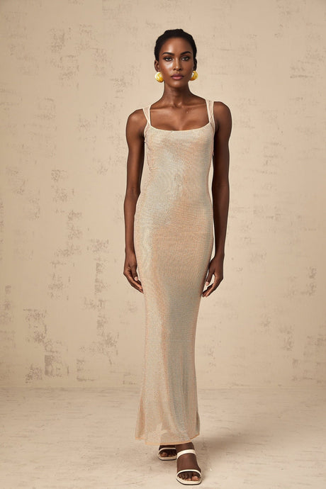 A long elegant maxi dress with crystal embellishments and an open back design