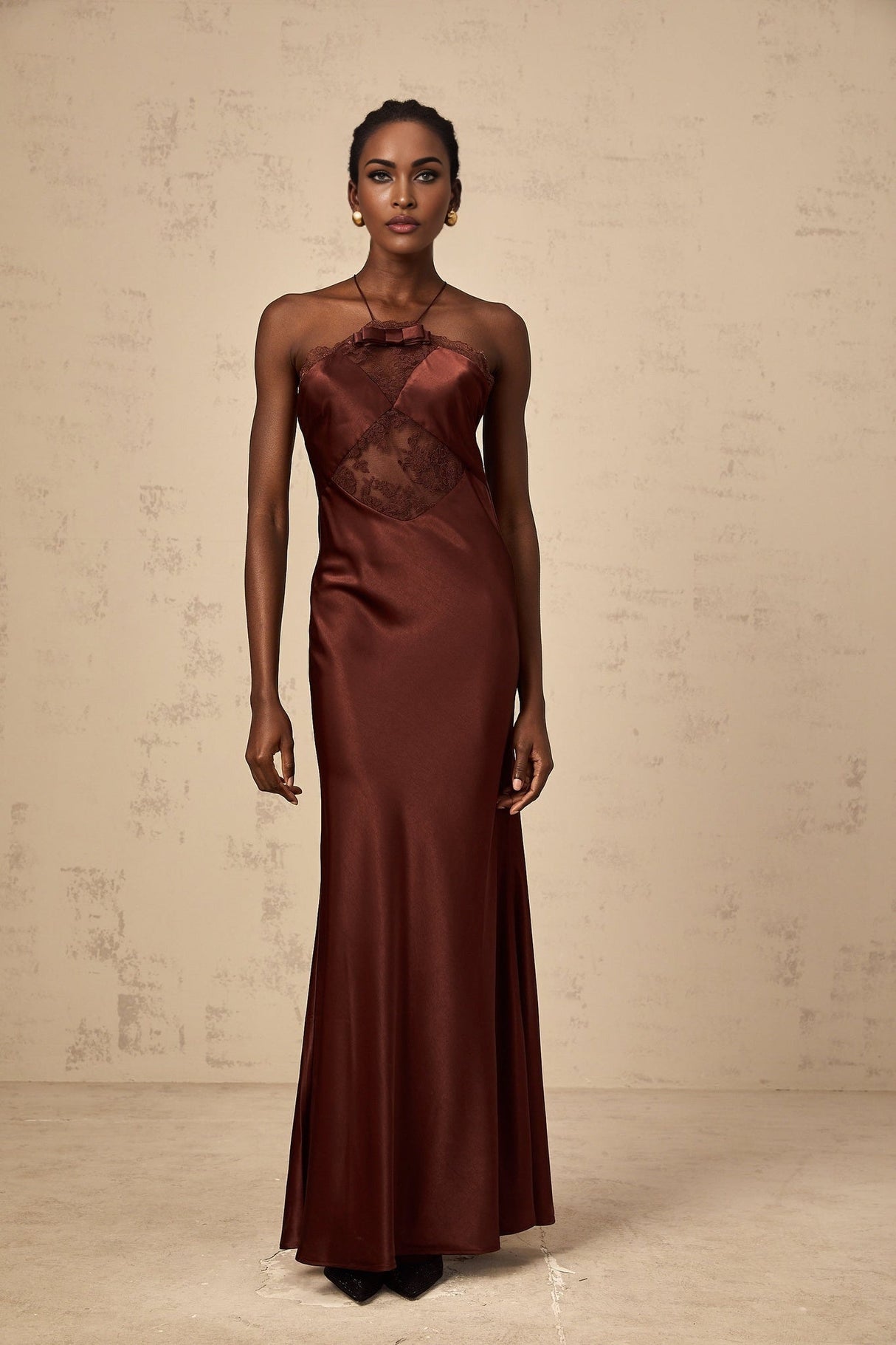 A long elegant winered maxi dress with satin fabric and lace panelling details named Eléonore