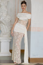A long floral lace maxi dress in neutral tones with ribbon panelling details and a flowing silhouette