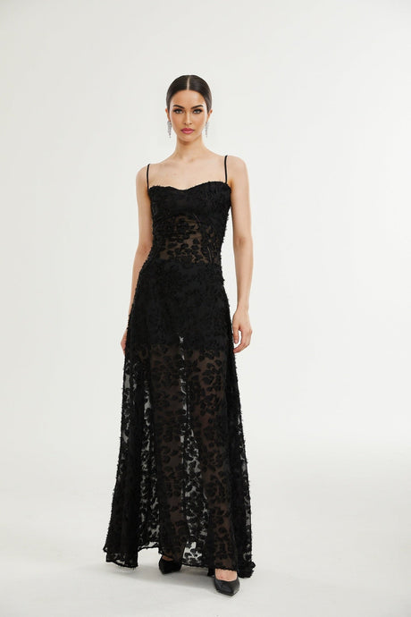 A long floral lace maxi dress with a feminine silhouette in a soft color palette suitable for formal occasions