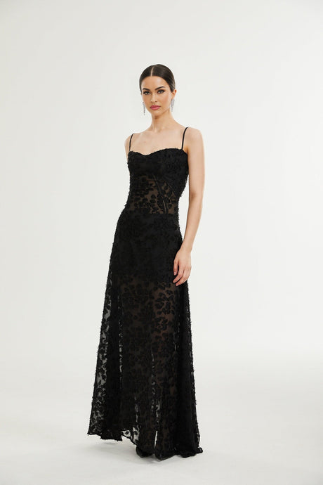 A long floral lace maxi dress with delicate pattern and feminine silhouette