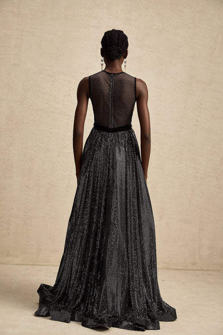 A long floral maxi dress with embroidery and embellishments featuring a delicate Agathe design pattern