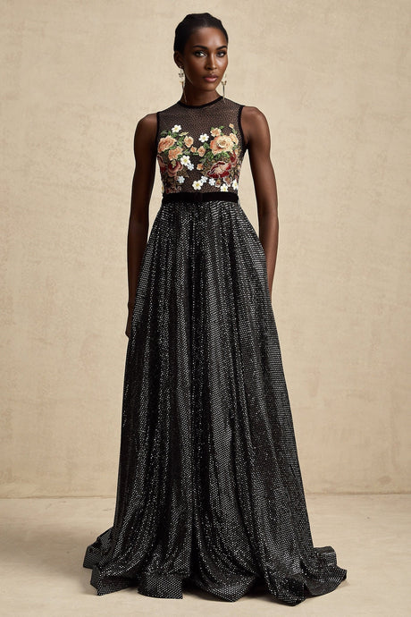 A long floral maxi dress with embroidery and embellishments featuring a delicate Agathe design