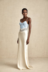 A long flowing maxi dress with lace trim and panelled design featuring delicate details and a feminine silhouette