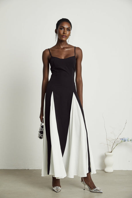 A long flowing pleated maxi dress in contrasting colors named Sofie
